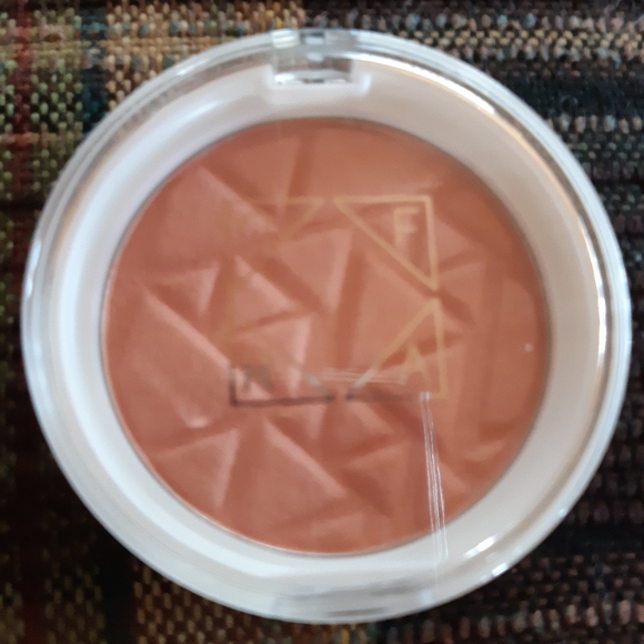 Ipsy bag and four items. - Picture 6 of 7